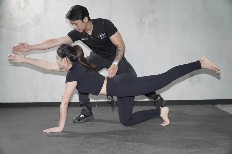 Tập gym với huấn luyện viên giúp hạn chế chấn thương